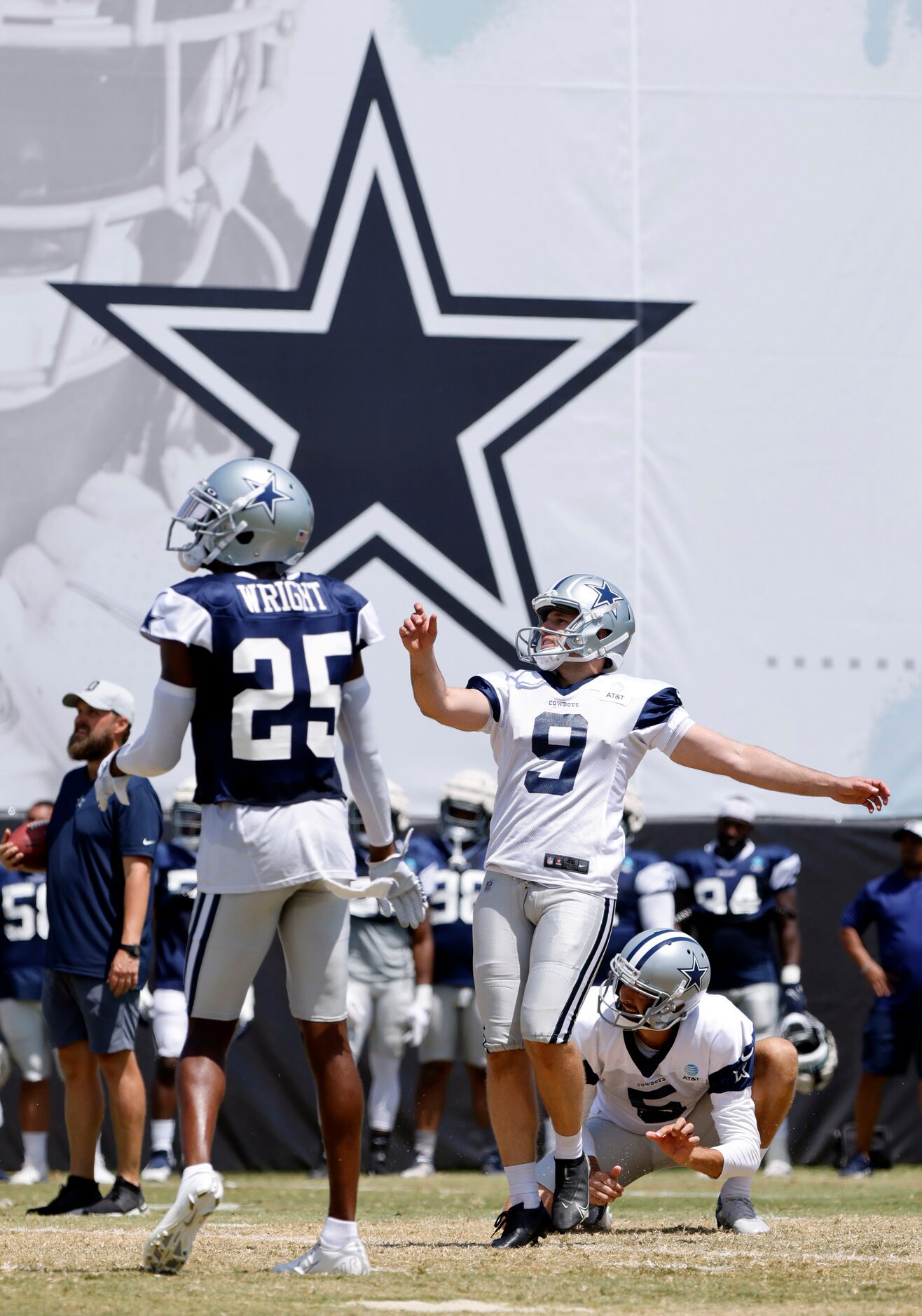 Dallas Cowboys kicker Lirim Hajrullahu (9) follows through on a midfield attempt during...