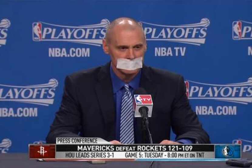 Dallas Mavericks head coach Rick Carlisle taped his mouth shut at a post-game press...