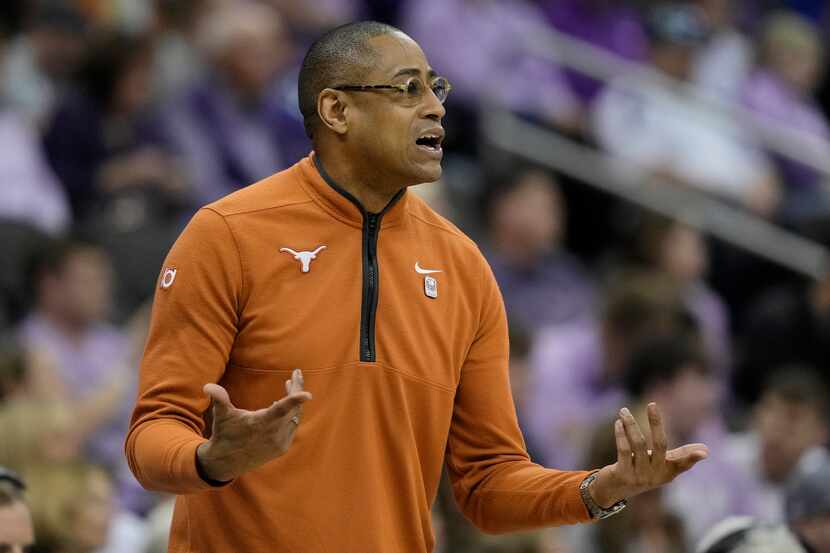 Texas head coach Rodney Terry questions a call during the first half of an NCAA college...