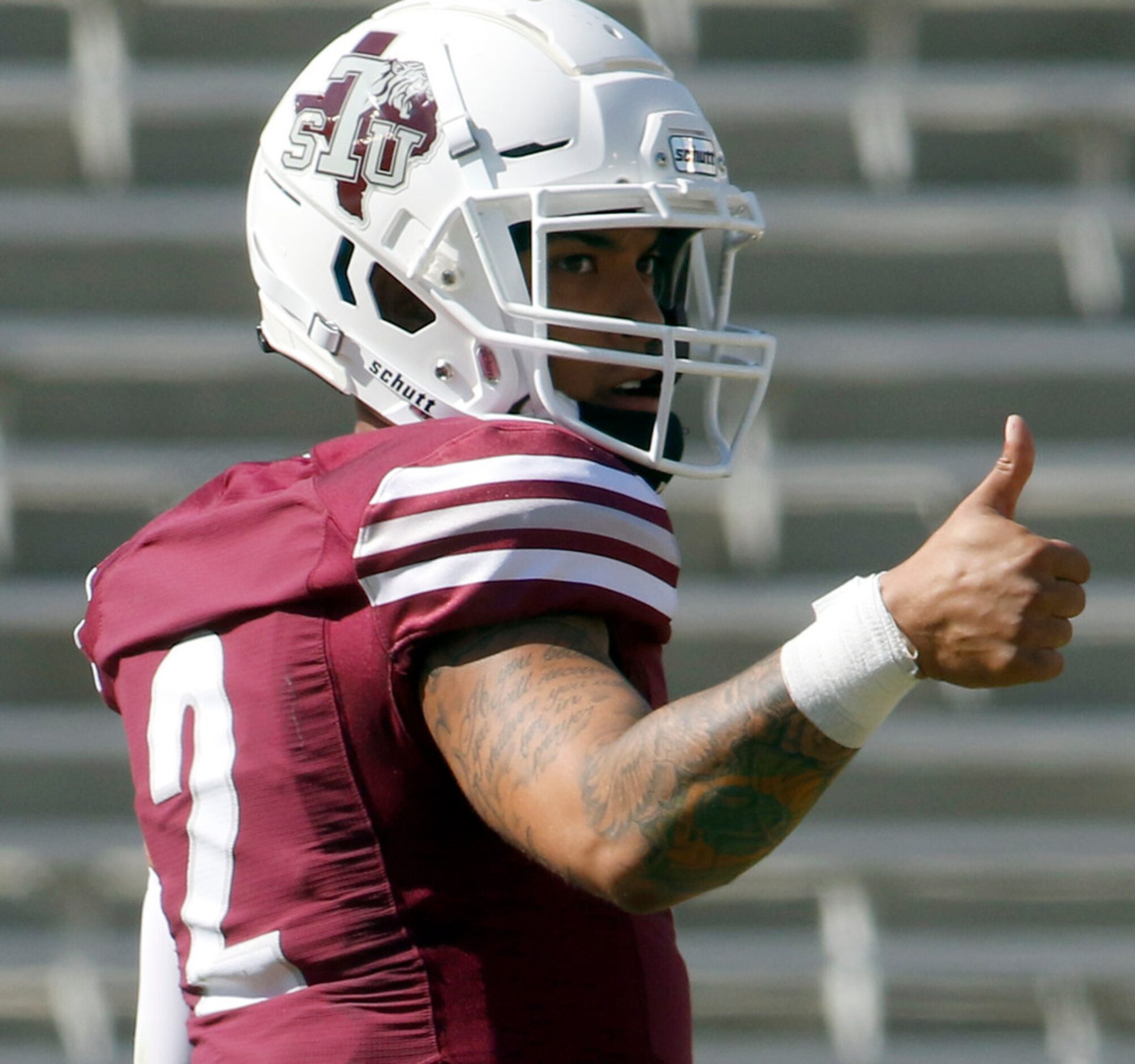 Texas Southern quarterback Devin Williams (2) confirms a question about a play with his...