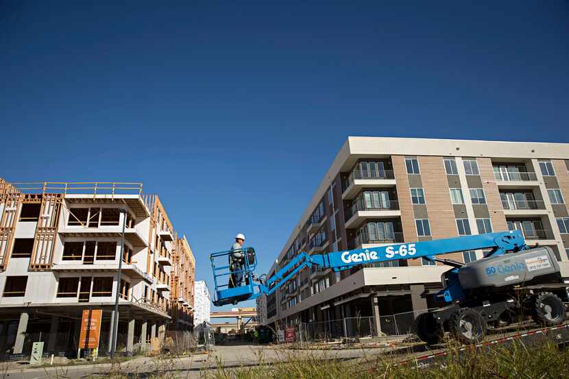 Construction continues at Trammell Crow Residential's Alexan CityLine apartments in...