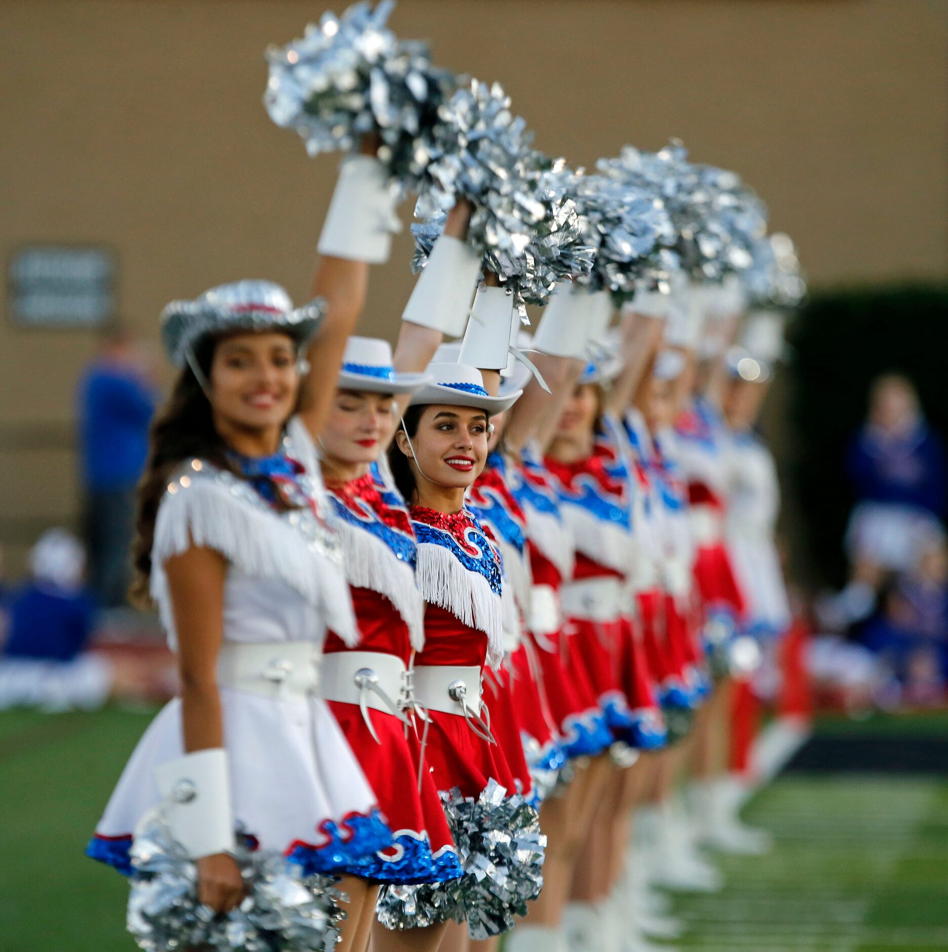 The Parish Episcopal drill teams lines up before the start of a high school football game...