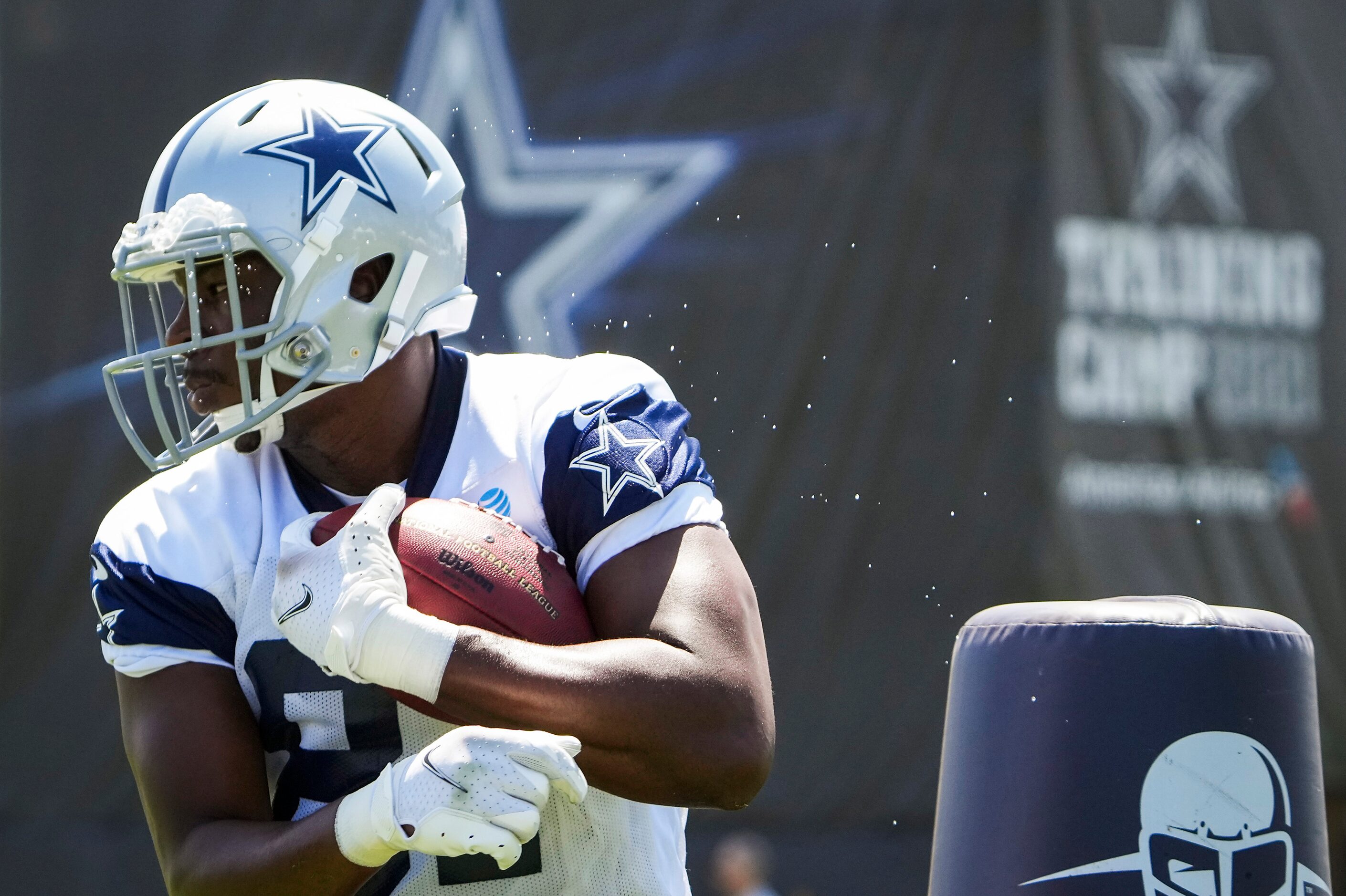 Dallas Cowboys tight end Jeremy Sprinkle (87) runs a drill during the first practice of the...