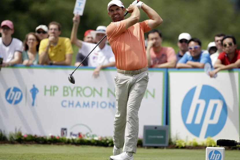 Padraig Harrington, of Ireland, hits off the 16th tee during the third round of the Byron...