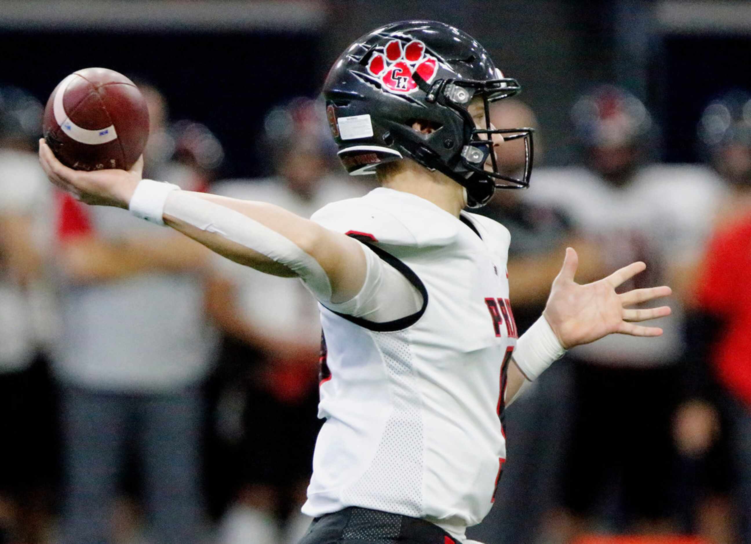 Colleyville Heritage High School quarterback Aj Smith (9) throws a pass during the first...