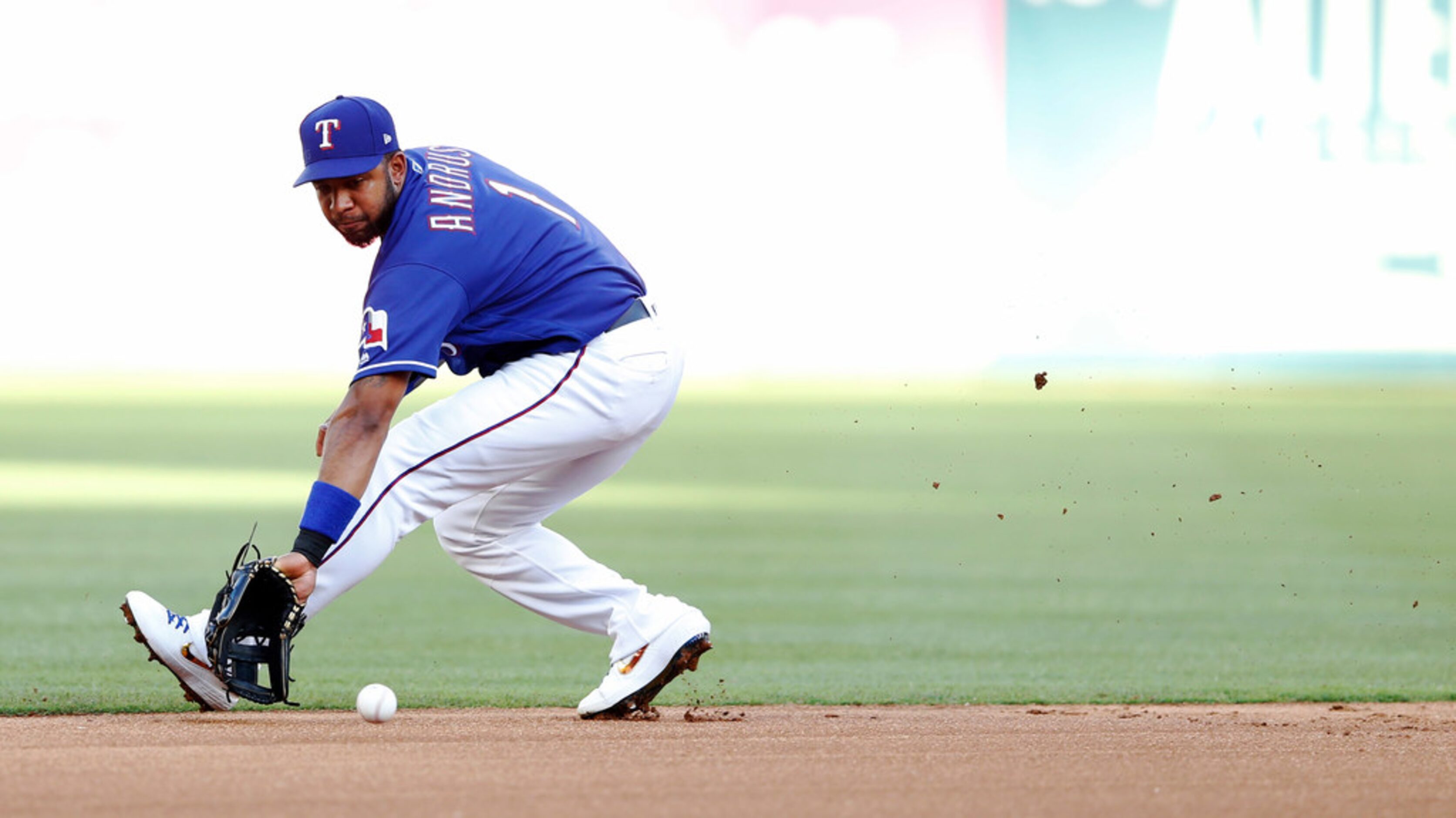 Texas Rangers shortstop Elvis Andrus (1) fields a ball hit by Los Angeles Angels first...