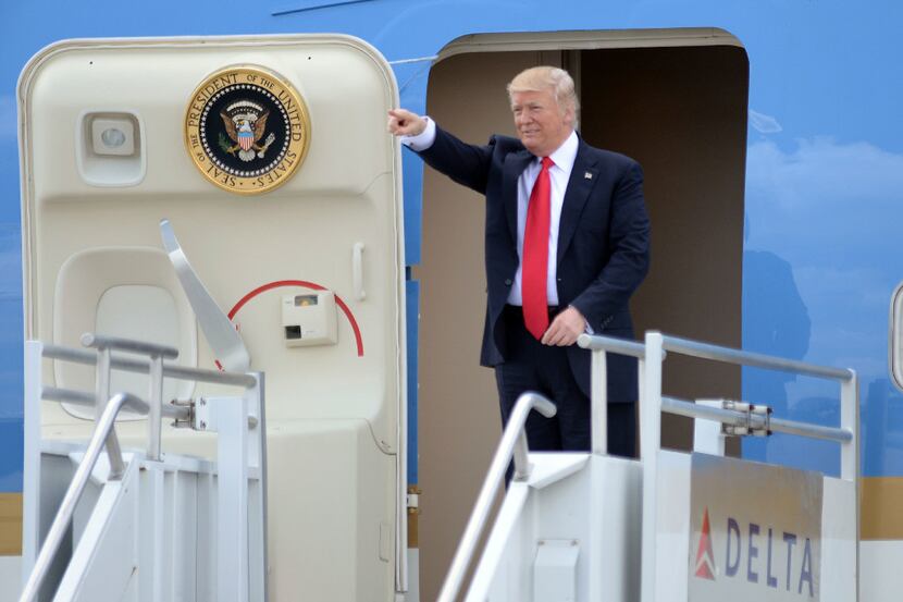 President Donald Trump arrives at Hartsfield Jackson International Airport, aboard Air Force...
