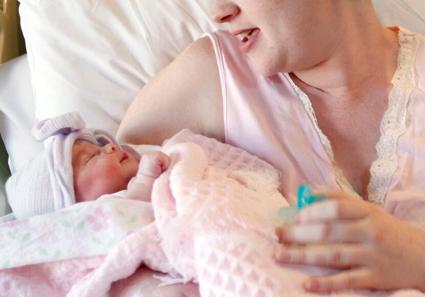 A mother holds her newborn baby at a hospital in Corpus Christi, Texas. 