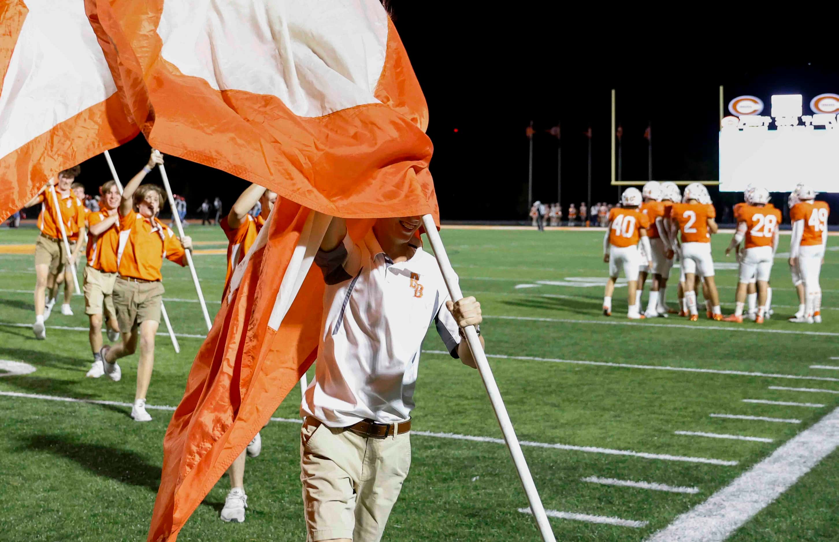 Celina High School drill team performs after a touchdown during the first half of a football...