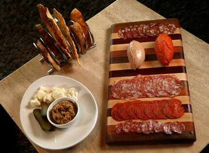 A charcuterie board at Knife Dallas. The nduja is the dark-red football-shaped spreadable meat.