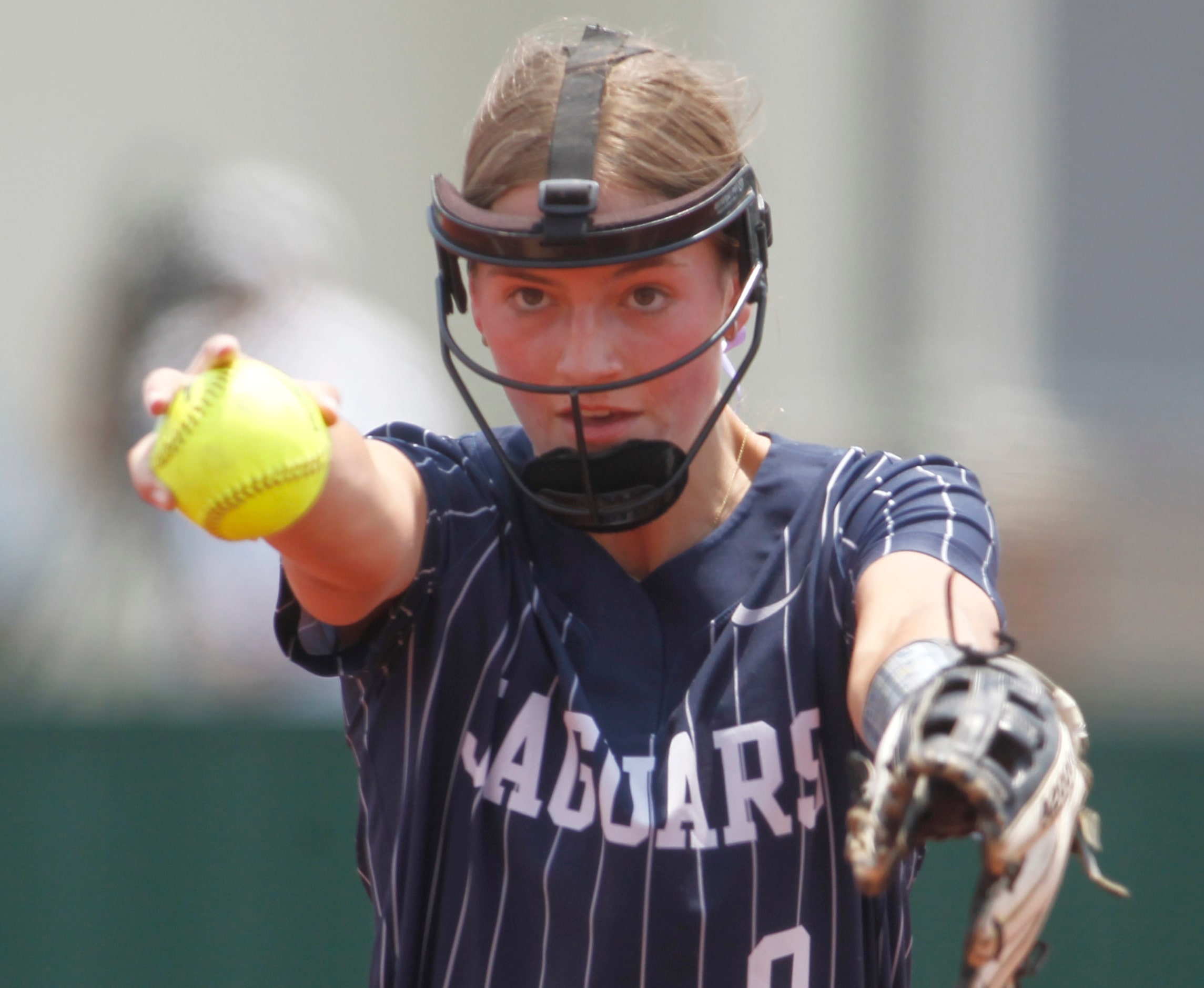 Flower Mound pitcher Abigail Jennings (9) delivers a pitch to a Keller batter during the top...