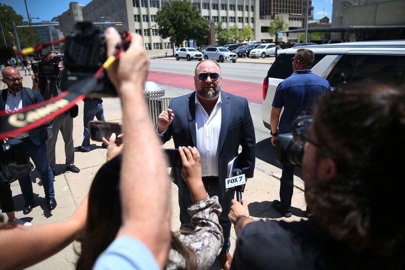 Alex Jones arrives at the Travis County Courthouse in Austin on Tuesday, Aug. 2, 2022.