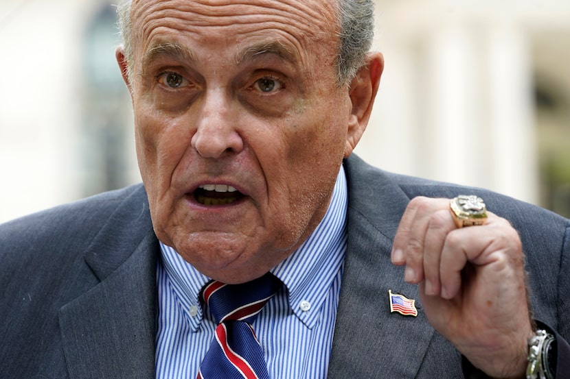 FILE - Former New York City Mayor Rudy Giuliani speaks during a news conference June 7,...