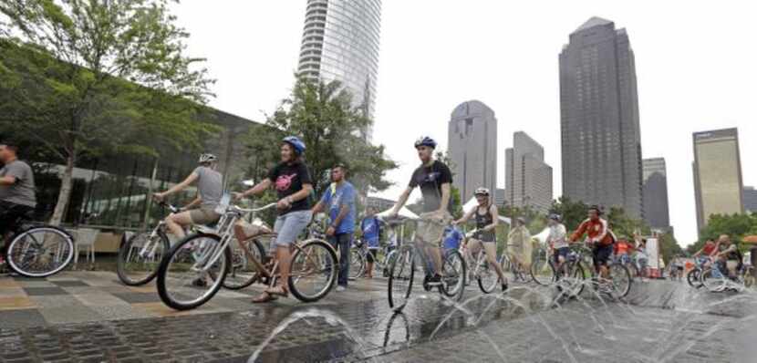 
Bicyclists left Klyde Warren Park en route to the Katy Trail on Monday during the Uptown...