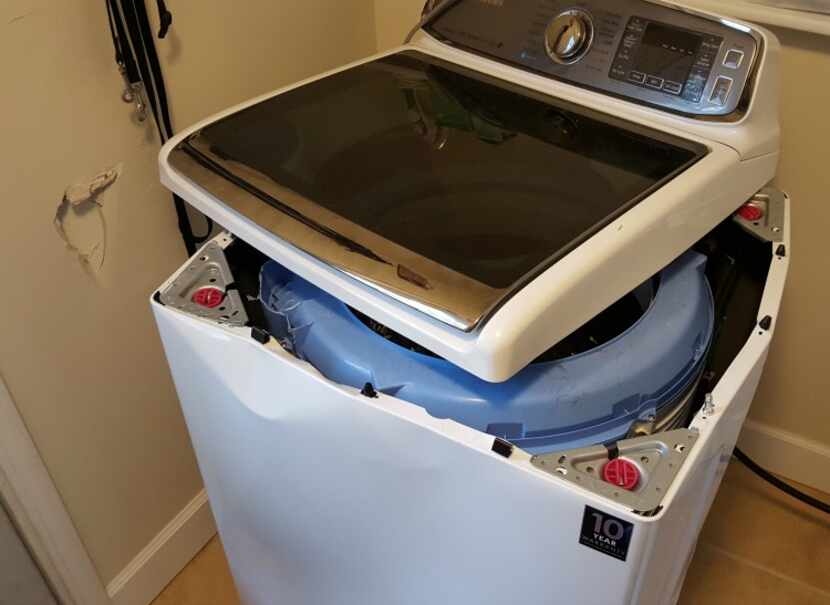 A washing machine that reportedly exploded due to a product defect.