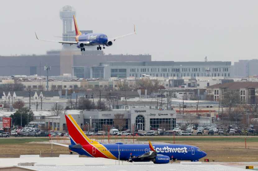A Southwest Airlines plane approaches for its landing at Dallas Love Field airport in...