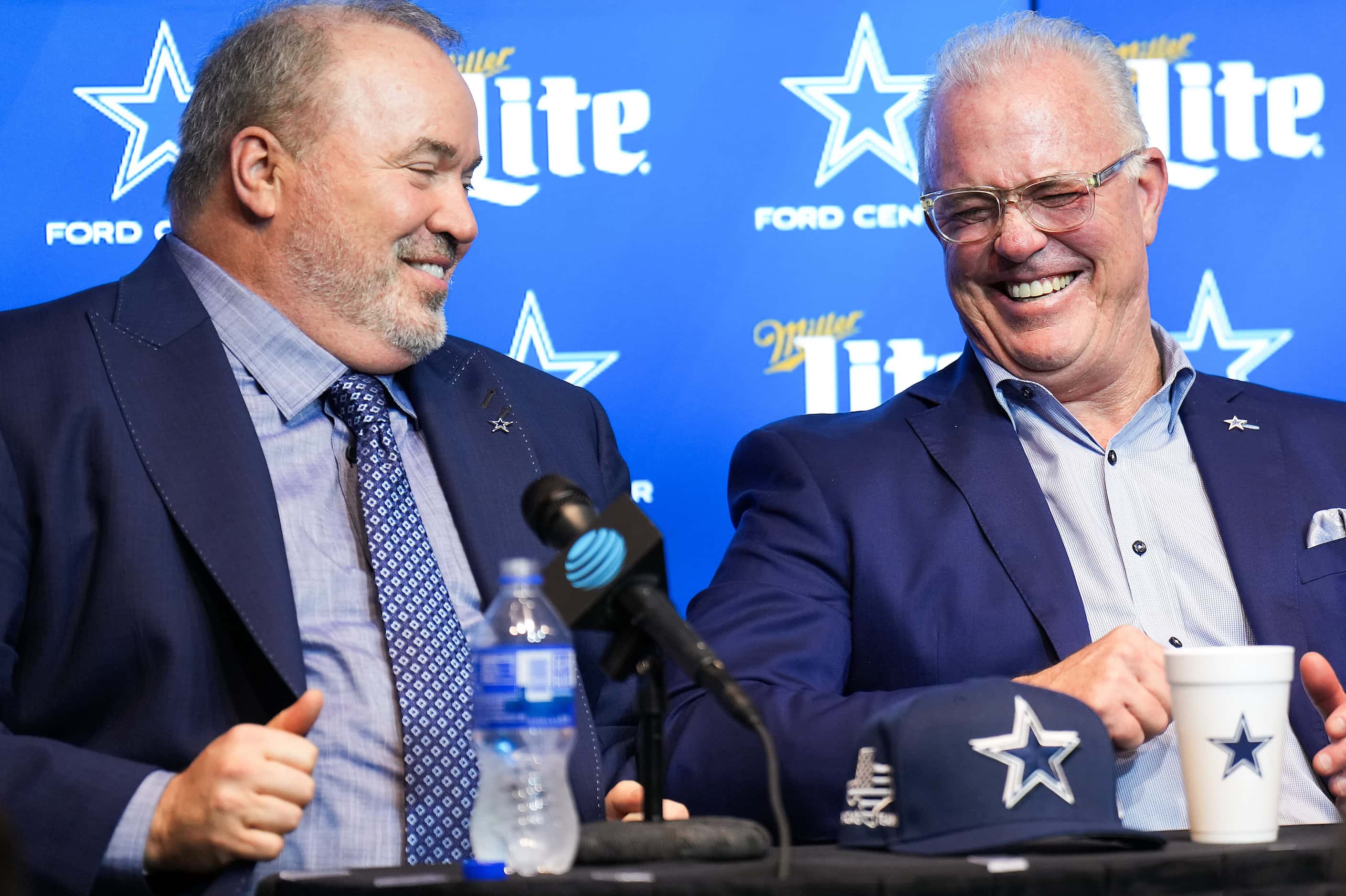 Dallas Cowboys head coach Mike McCarthy laughs with executive vice president Stephen Jones...