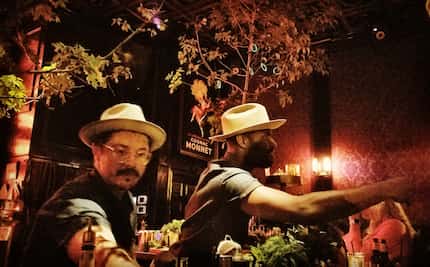 Bartenders Jesse Powell and Jermey Elliott weren't so much 'in the weeds' as they were the...