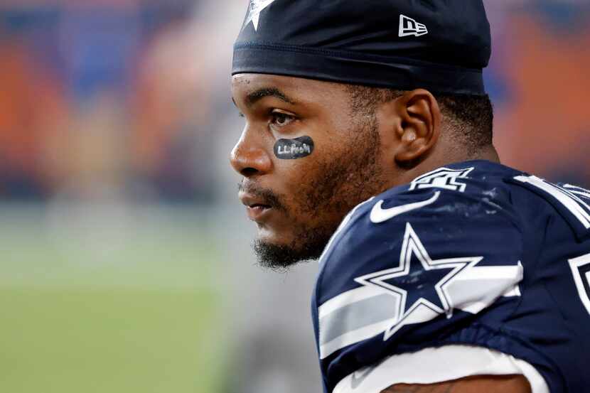 Dallas Cowboys defensive end Sam Williams (54) sits on the bench after being penalized for...