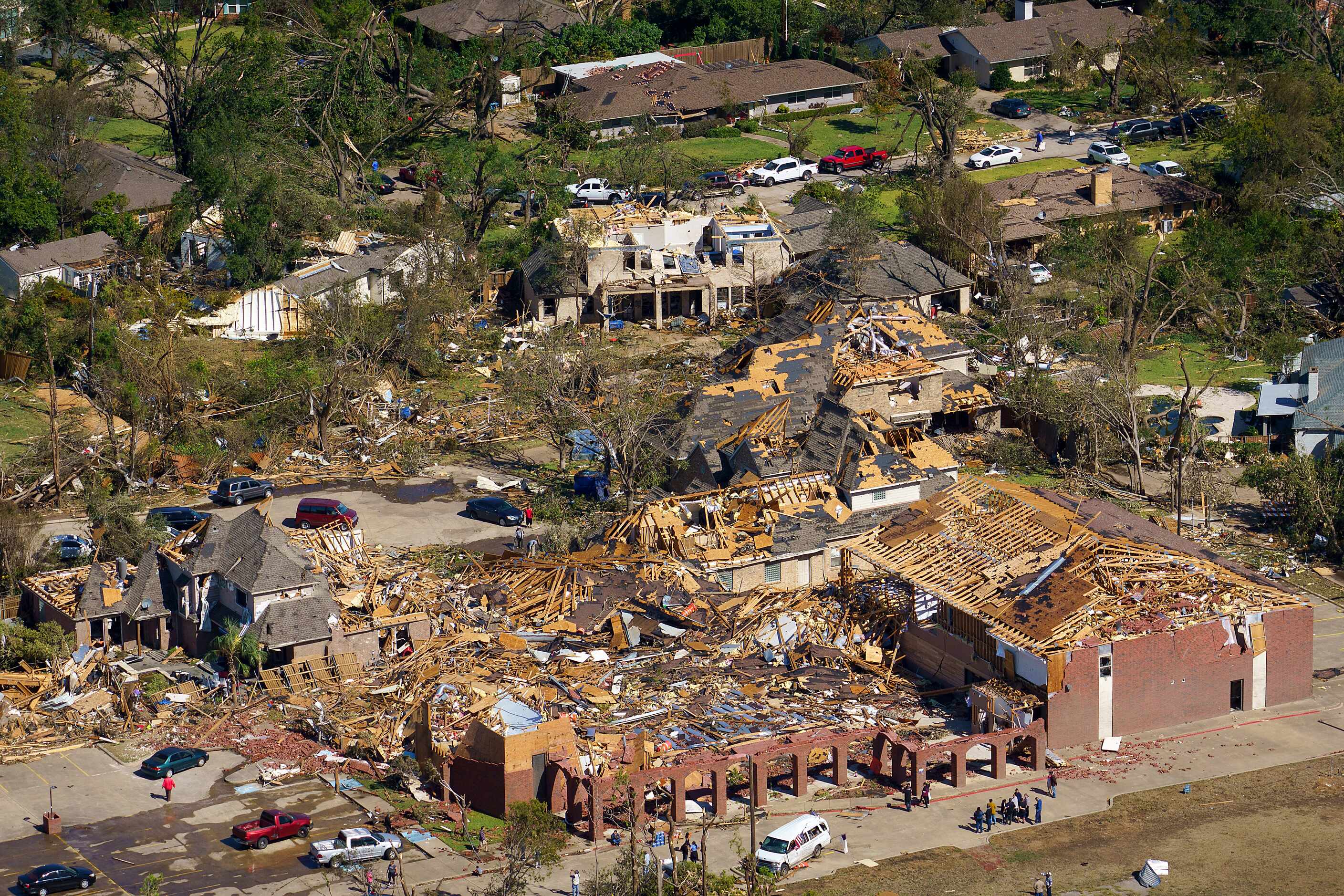 Damage to Primera Iglesia Bautista Mexicana church (bottom) on Walnut Hill and homes behind...