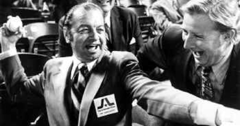 Tom Vandergriff (left) and Texas Rangers owner Bob Short (right) were in the stands when...