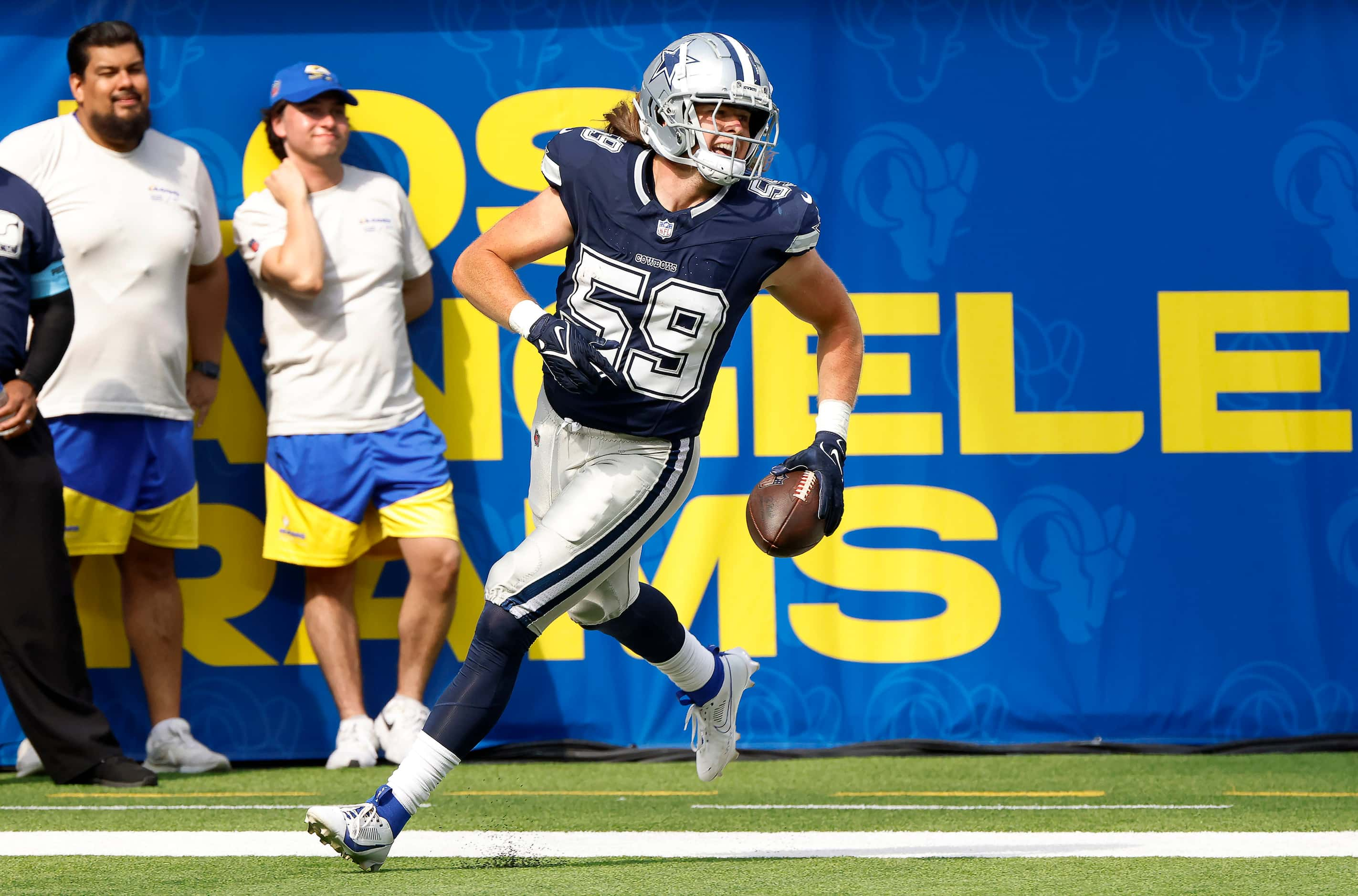 Dallas Cowboys linebacker Brock Mogensen (59) celebrates his interception of Los Angeles...