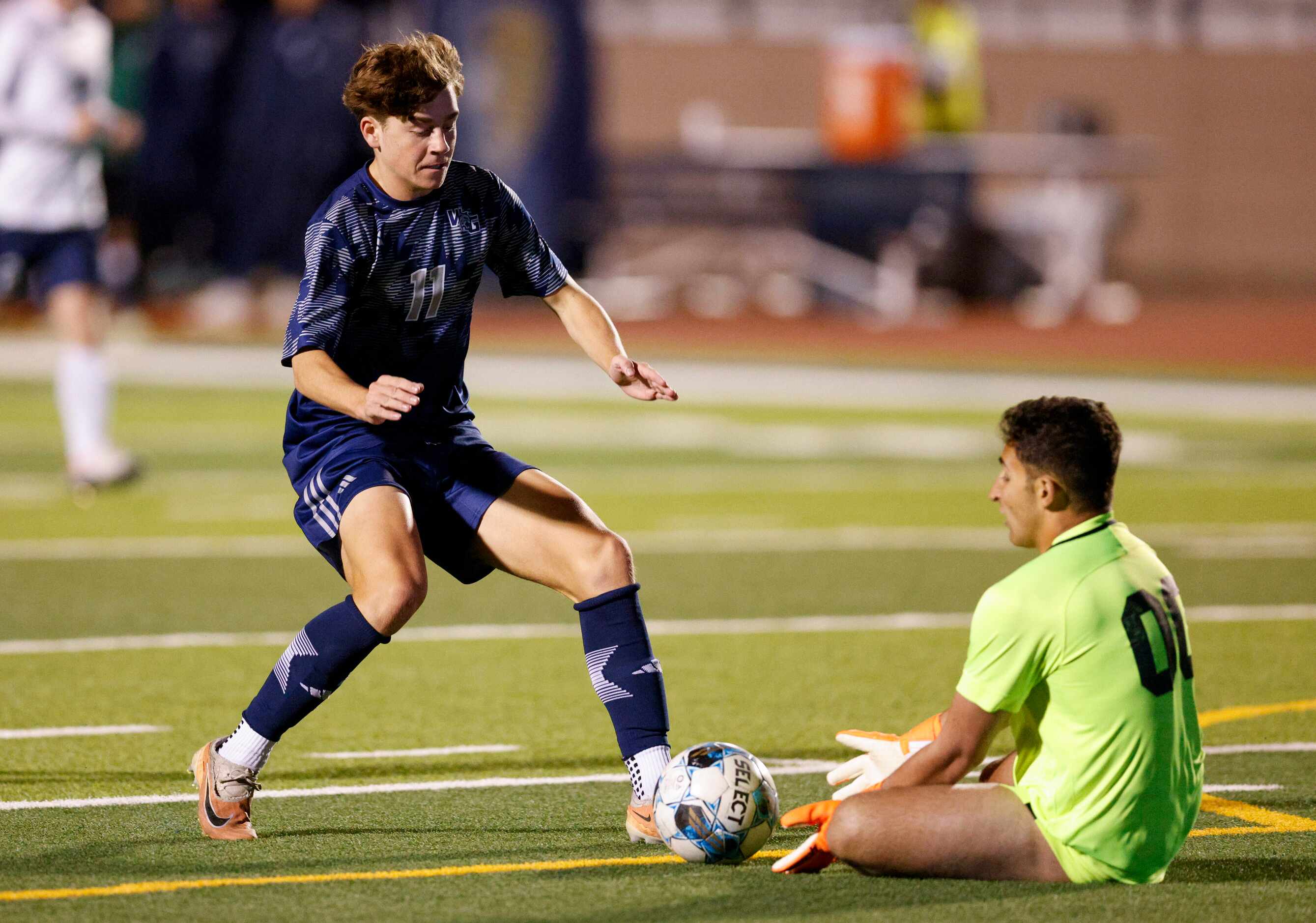 Frisco Reedy goalkeeper Rami Rammal (00) dives to save the ball ahead of Prosper Walnut...