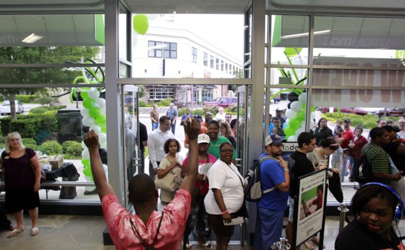 Customers entered the newly opened Simply Mac store in Cedar Hill on Friday. Simply Mac, a...