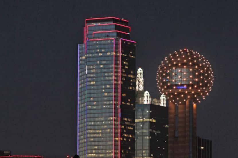 The Bank of America tower, best known for its solid green outline, has a new lighting system...