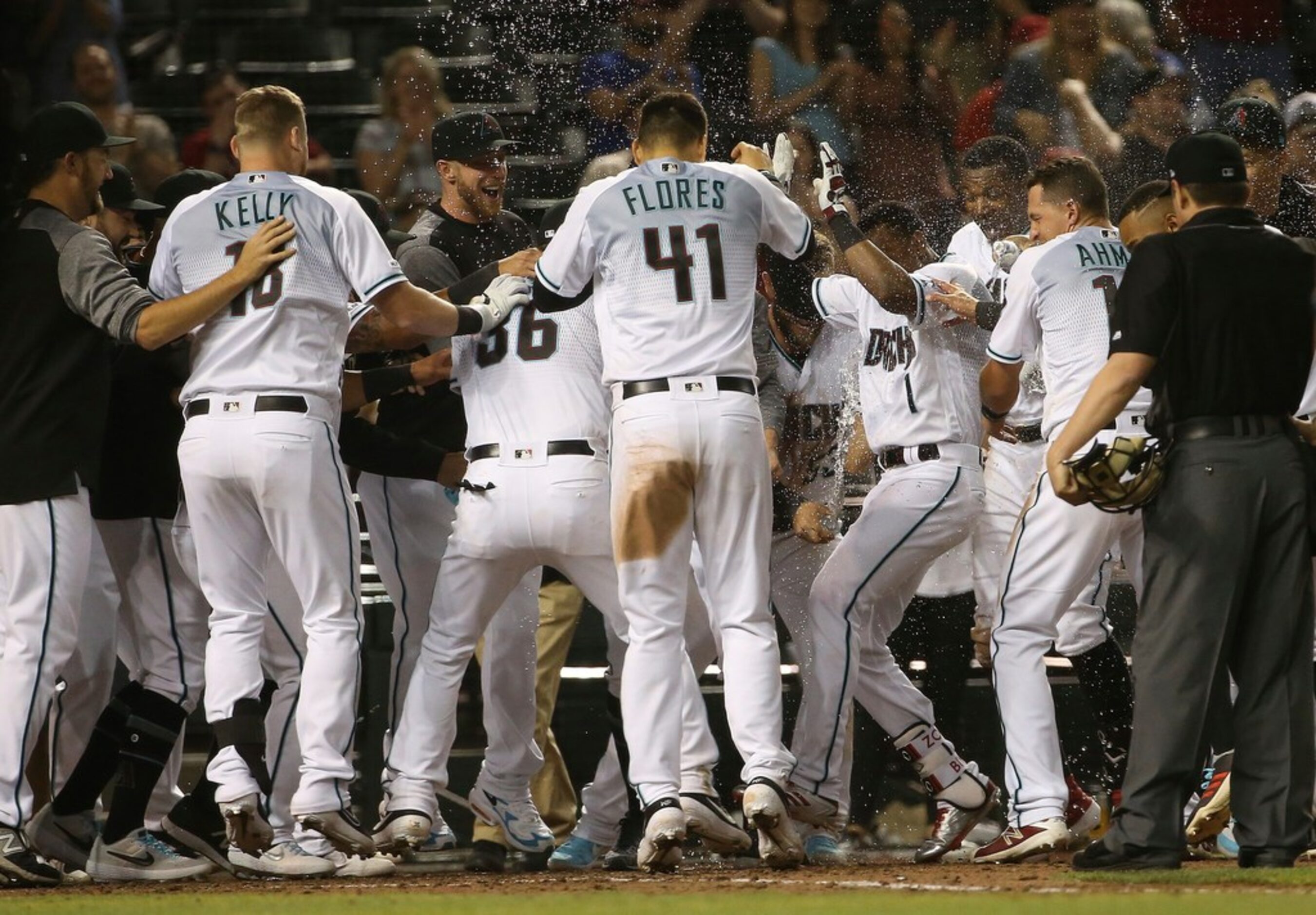 Arizona Diamondbacks' Jarrod Dyson (1) celebrates his walk-off, two-run home run against the...