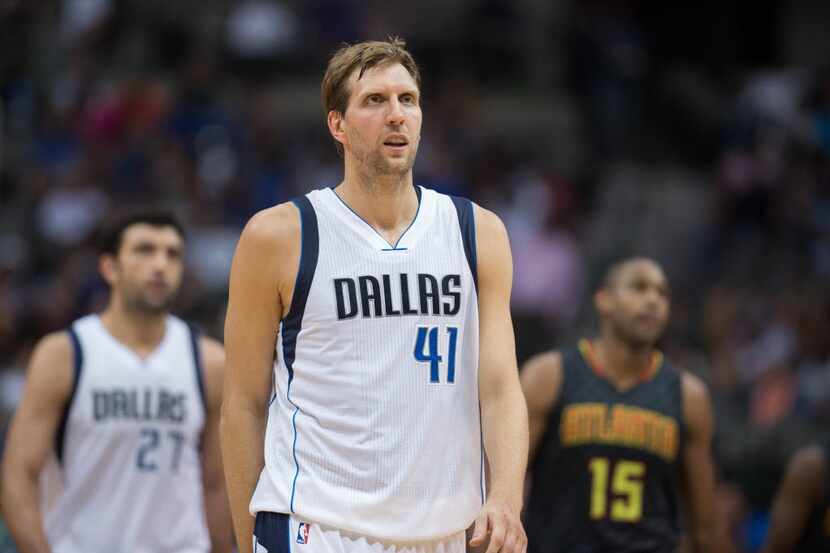 Oct 16, 2015; Dallas, TX, USA; Dallas Mavericks forward Dirk Nowitzki (41) looks on against...