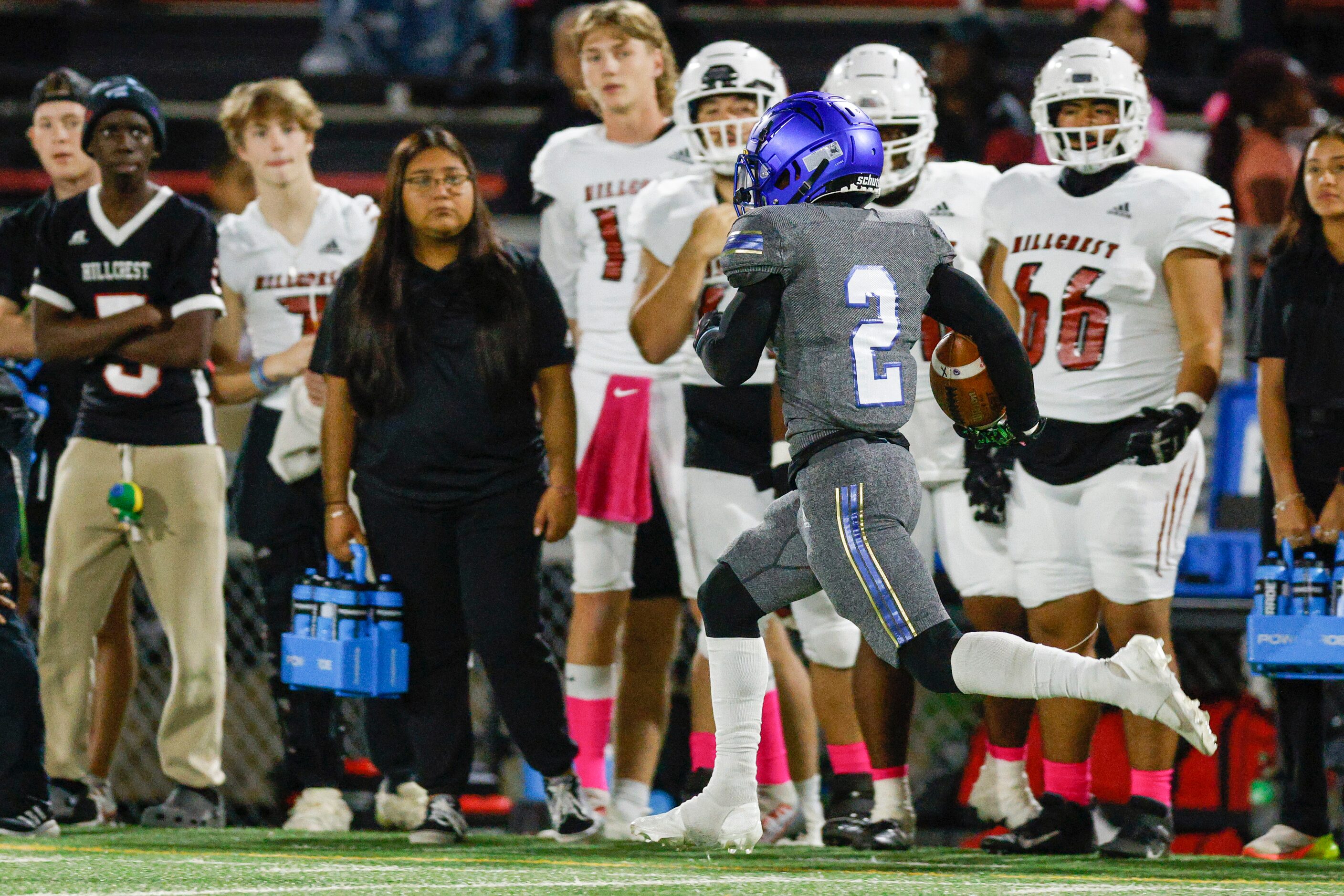 Conrad running back Carlos Walker (2) returns a kickoff for a touchdown during the first...