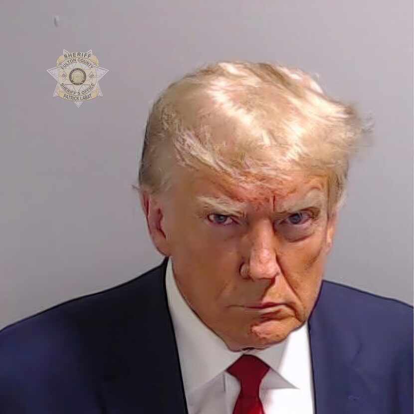 This booking photo provided by Fulton County Sheriff’s Office, shows former President Donald...