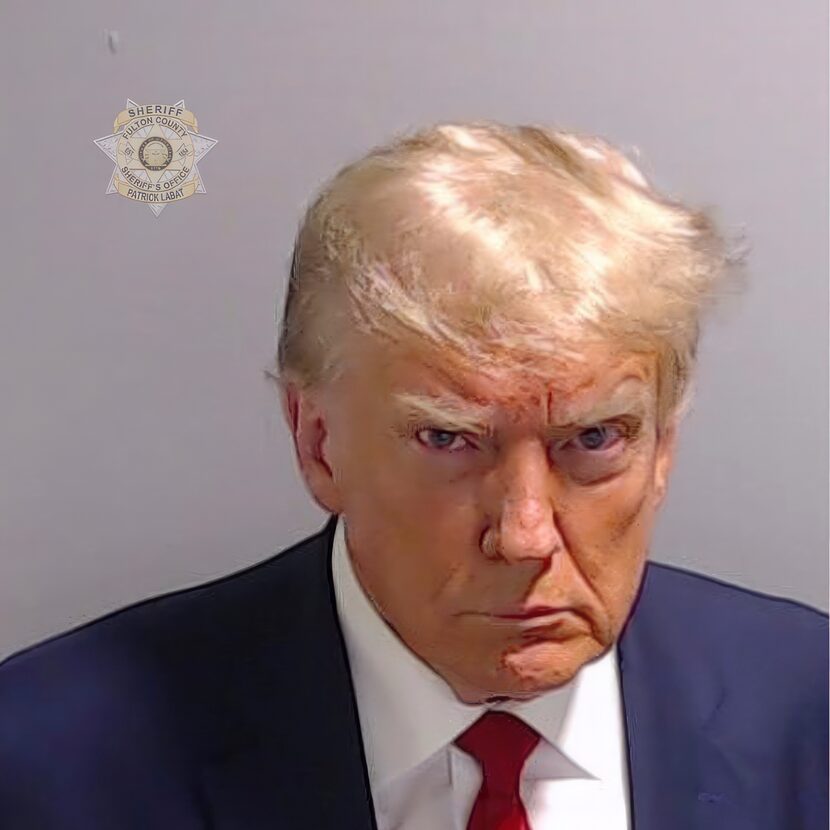 This booking photo provided by Fulton County Sheriff’s Office, shows former President Donald...