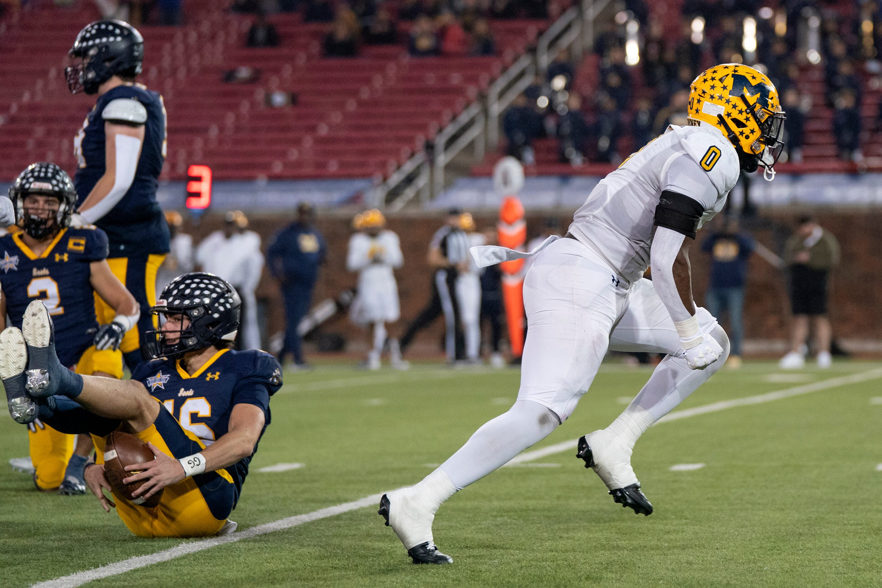 McKinney senior linebacker Makhi Frazier (0) celebrates after sacking Highland Park senior...