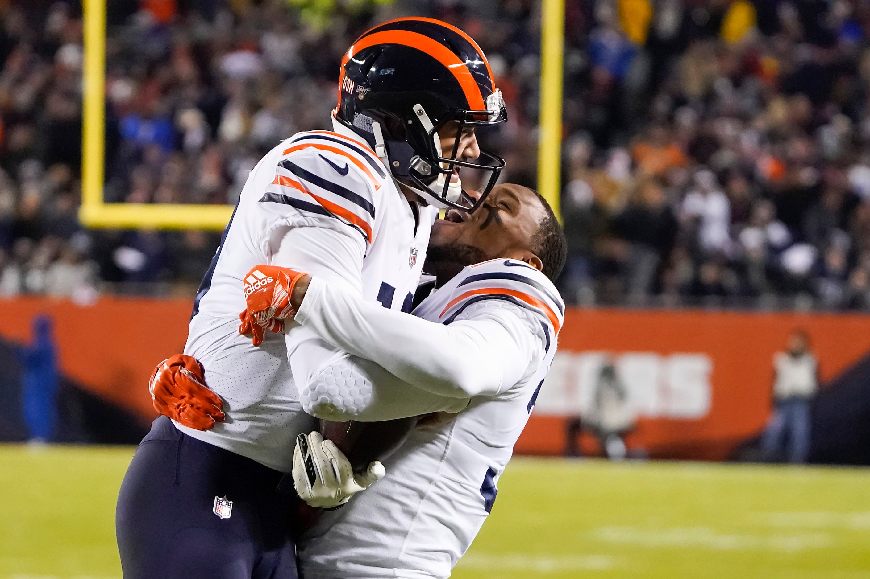 Chicago Bears quarterback Mitchell Trubisky (10) celebrates with free safety Eddie Jackson...