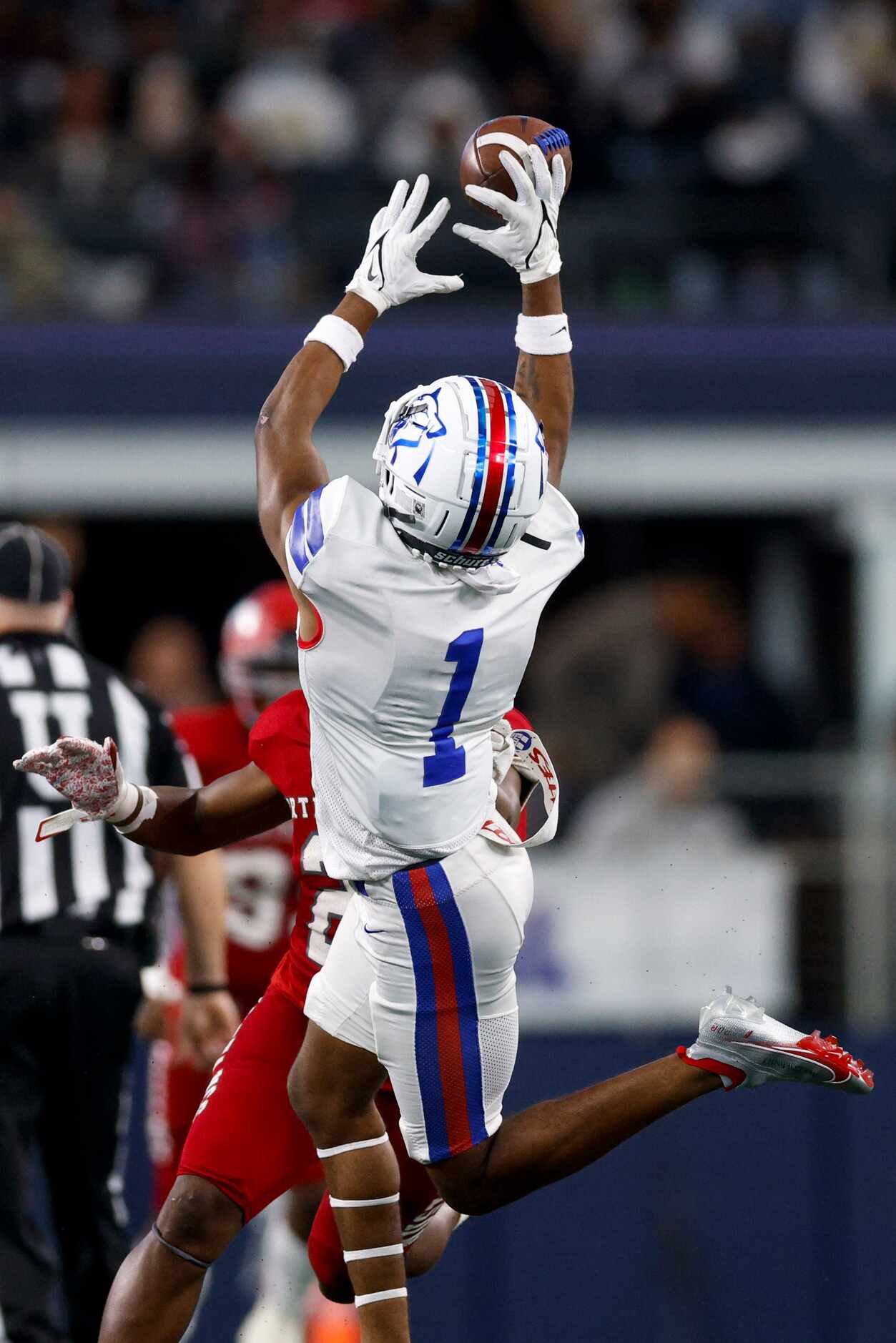 Duncanville wide receiver Lontrell Turner (1) leaps to make a catch over Galena Park North...