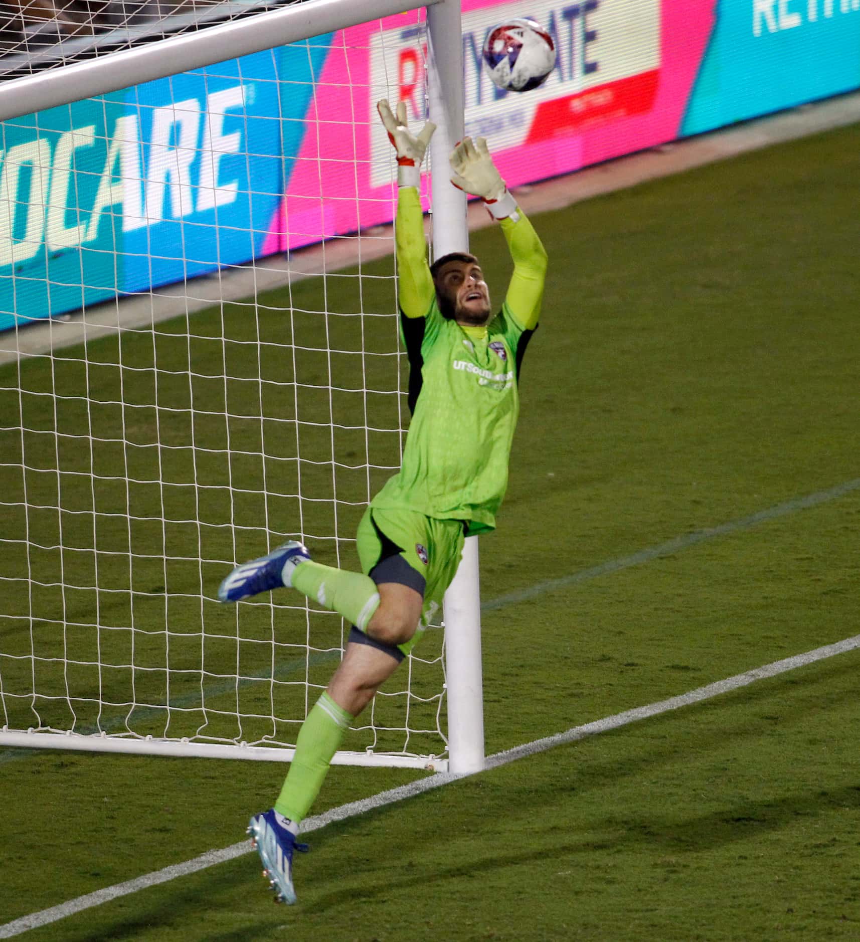 FC Dallas goalkeeper Maarten Paes (30) leaps to make a save during extra time of a 1-1 draw...