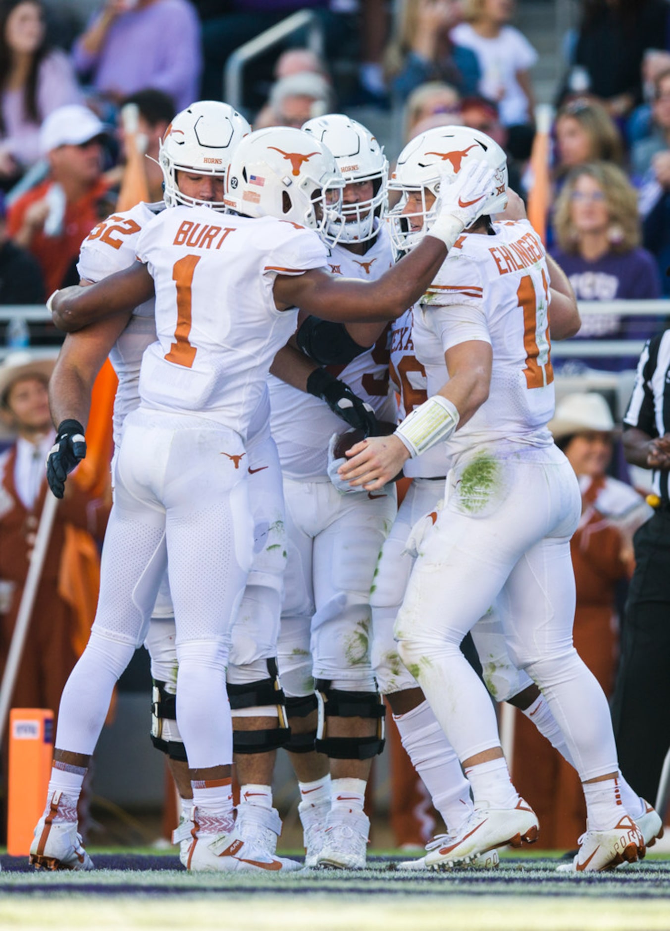 Texas Longhorns celebrate a touchdown during the second quarter of an NCAA football game...