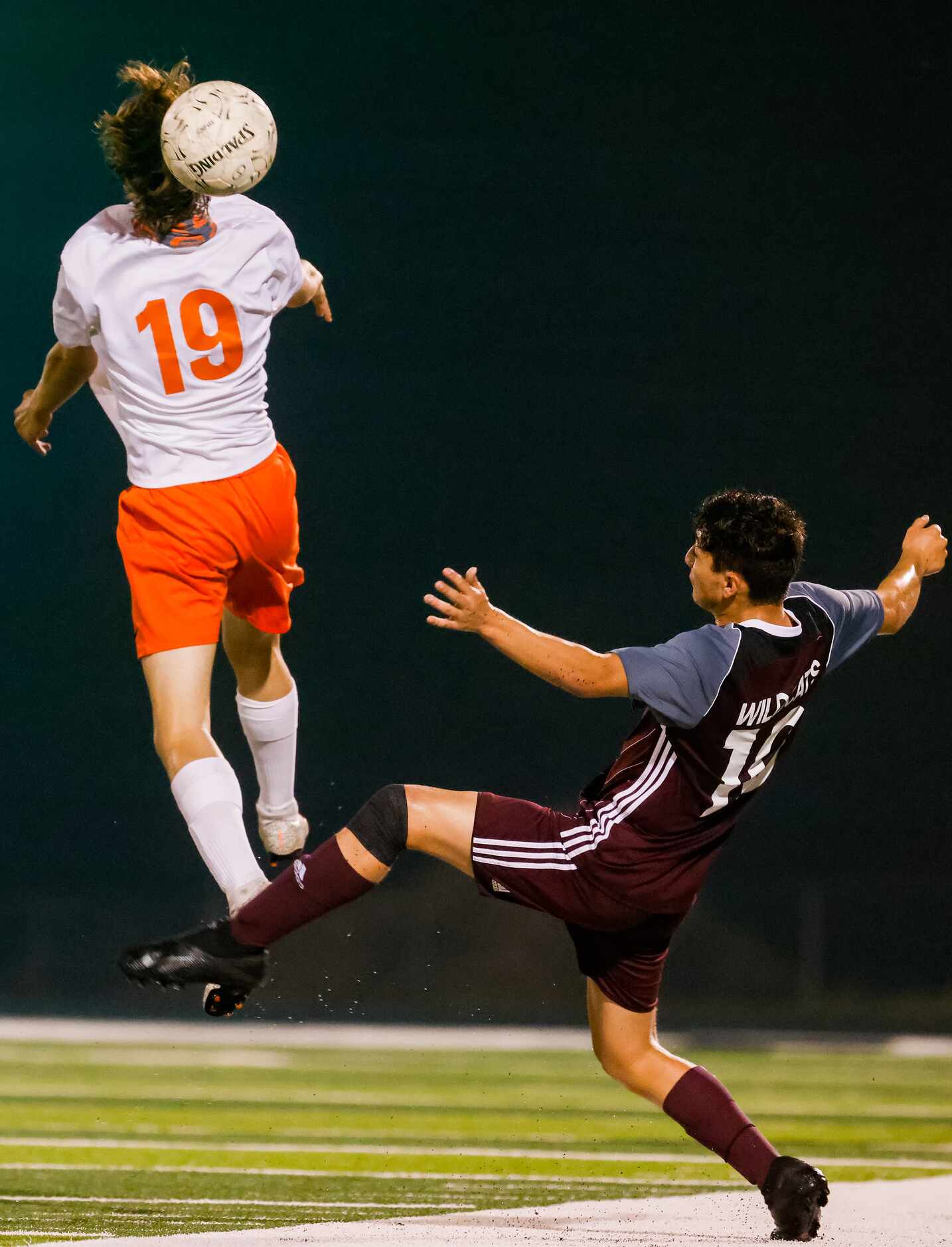 Celina's Andy Allam (19) hits the ball away from Palestine's Ty Carnes (13) during the first...