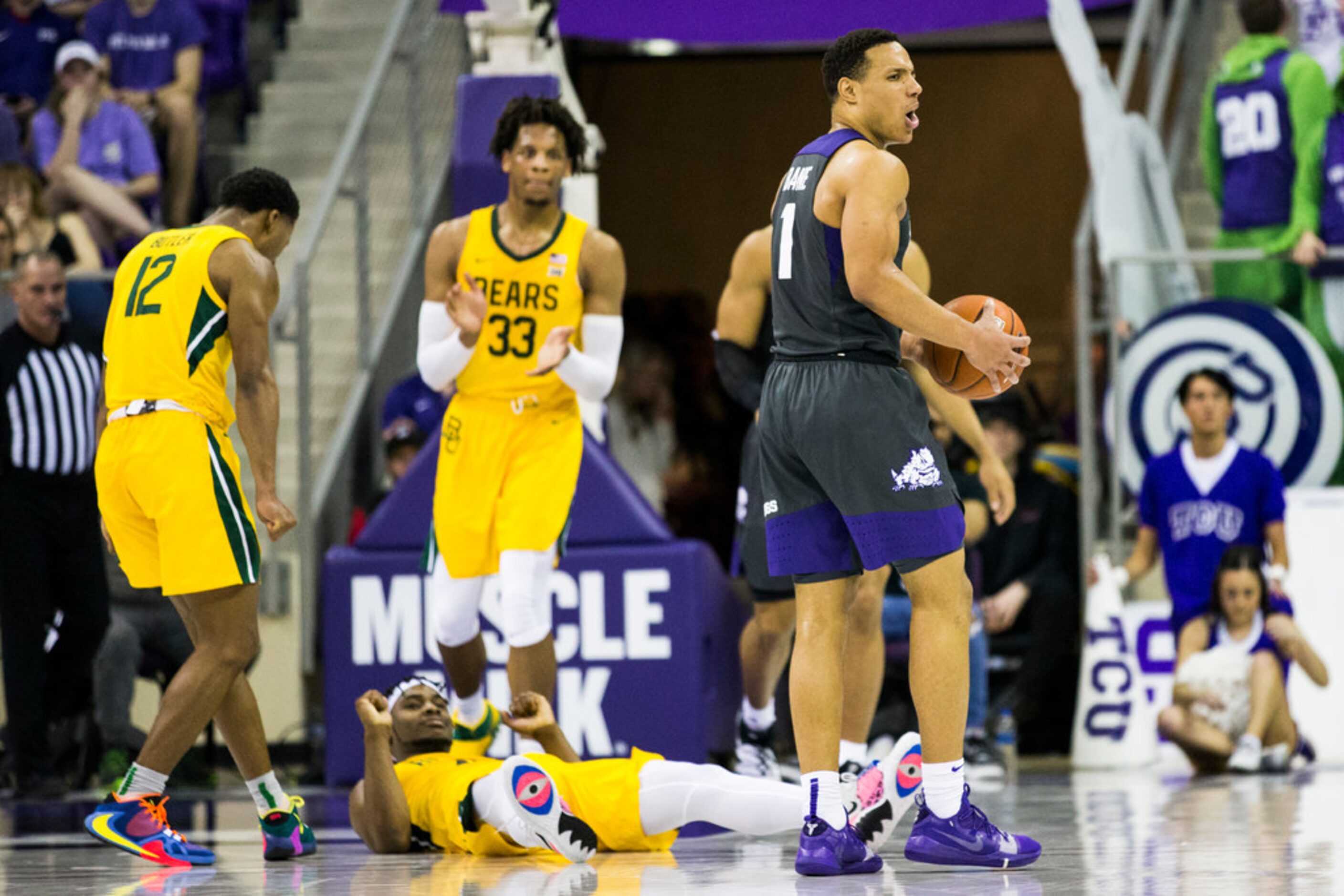 TCU Horned Frogs guard Desmond Bane (1) reacts after he fouls Baylor Bears guard Davion...