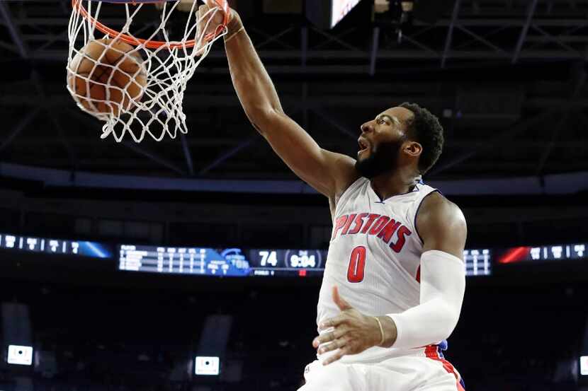 Detroit Pistons center Andre Drummond dunks during the second half of an NBA basketball game...