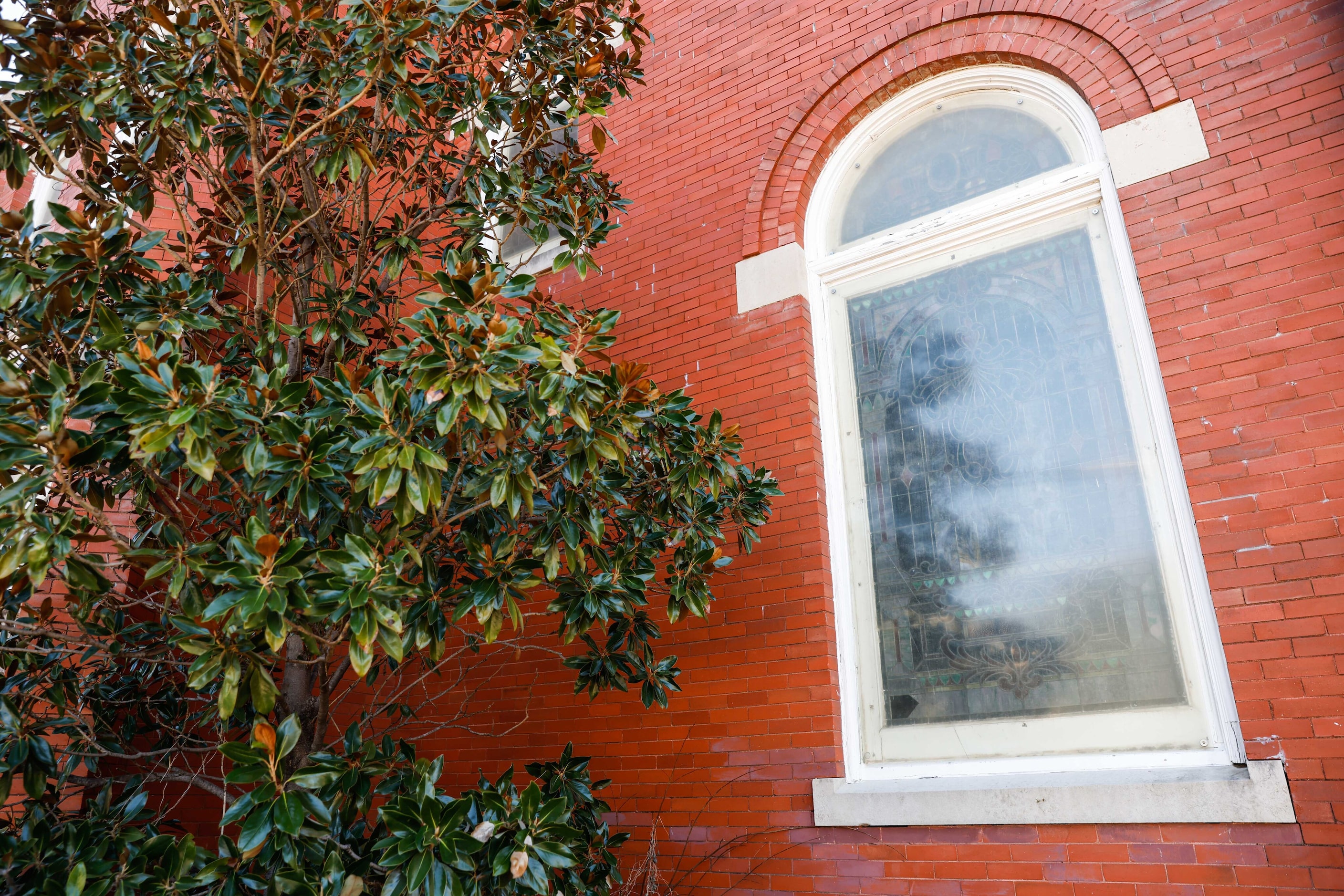 One of the stained-glass windows, protected with a bullet-proof layer on its exterior.