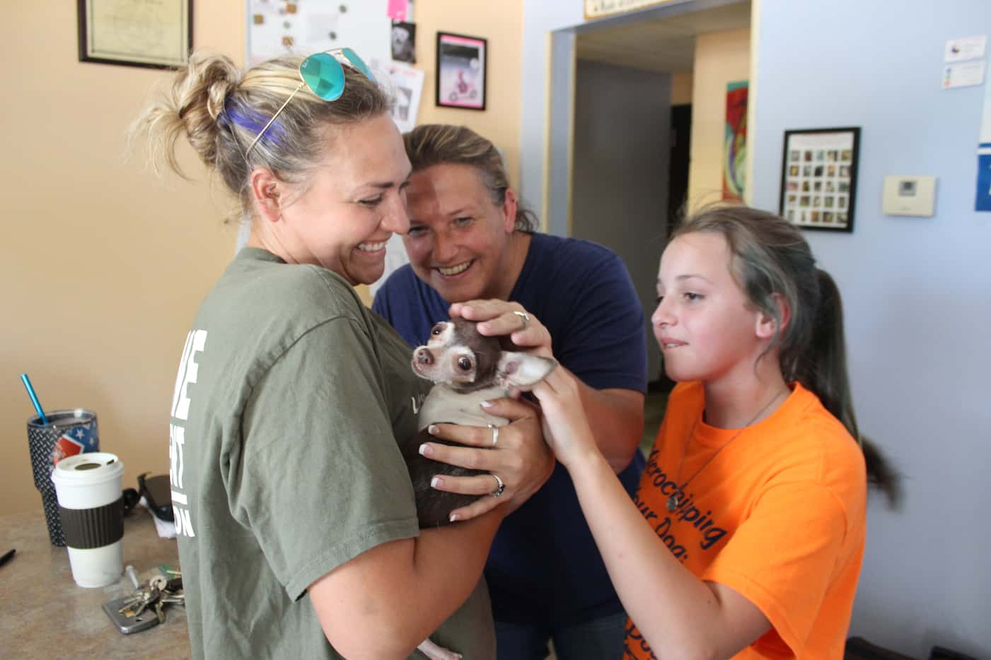 Canton Animal Shelter manager Ladeania Jones (left) and employee Paula Bates greet Old Lady...