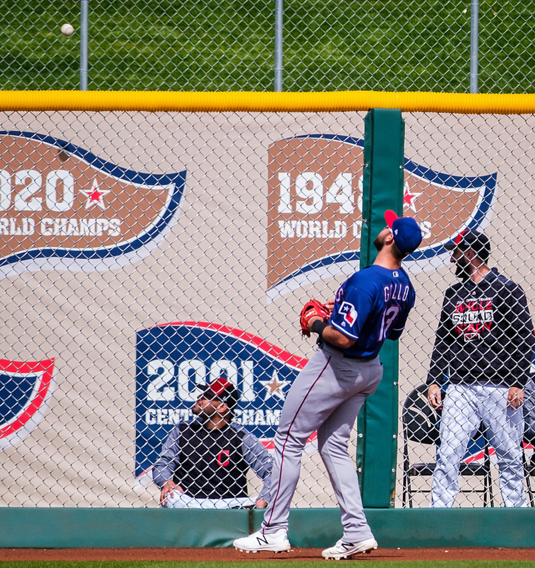 Texas Rangers left fielder Joey Gallo watches a home run off the bat of Cleveland Indians...