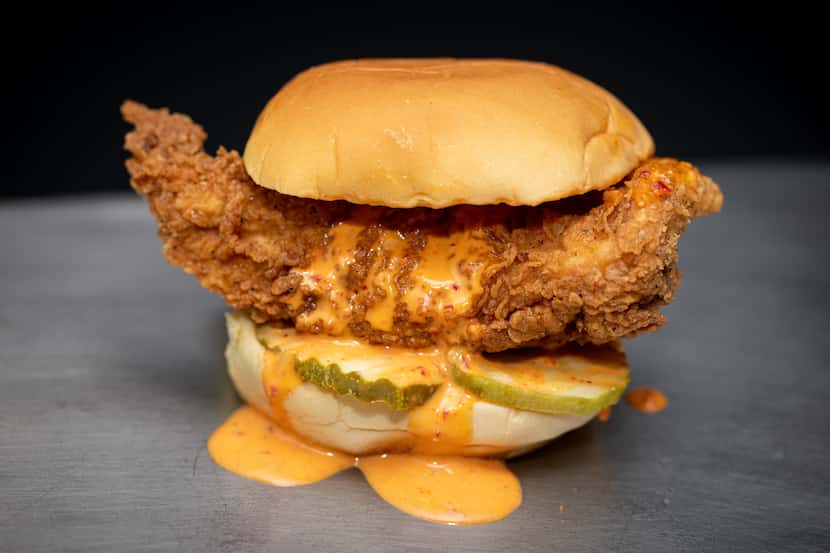 The spicy fried chicken sando at Fuku is one of the most popular items. Fuku is one of chef...