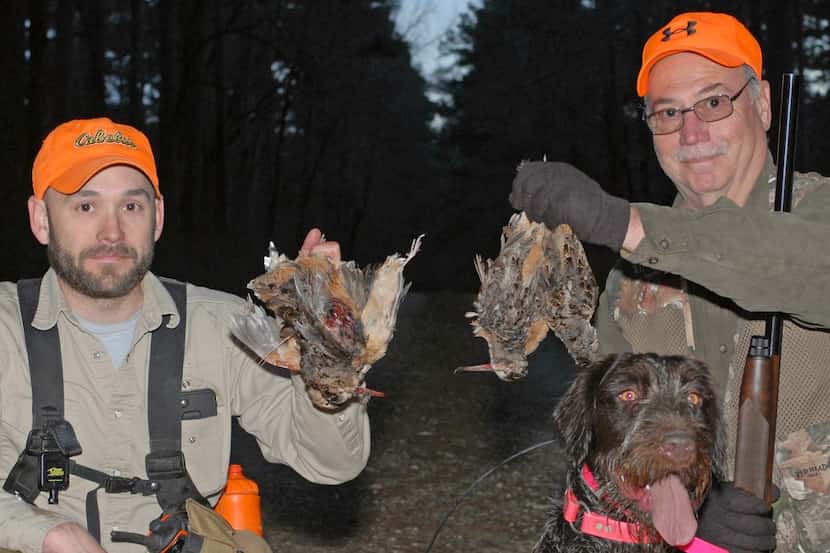 Andrew Boatman and his dad, Tim Boatman, with the fruits of an afternoon timberdoodle hunt...