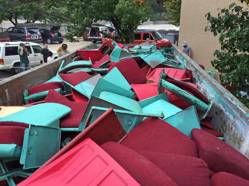 
Seats removed from the 77-year-old Lakewood Theater sat in a dumpster Thursday, but not for...