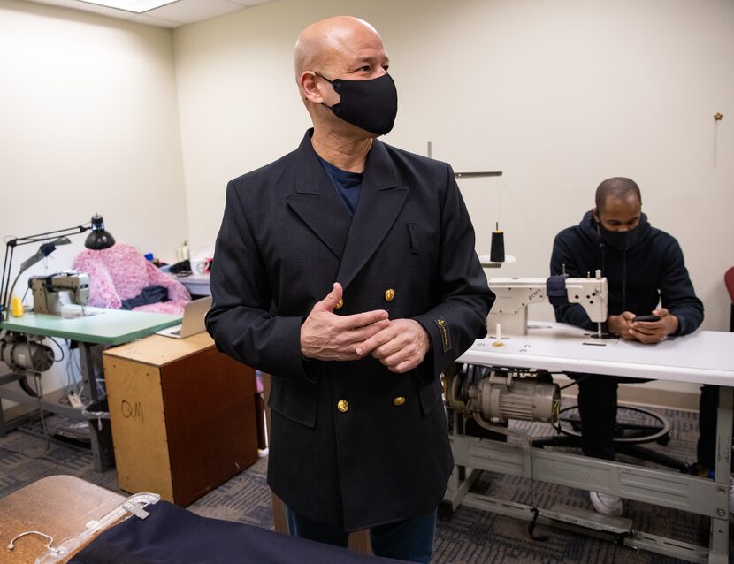 Dallas Police Chief Eddie García tries on his uniform at DPD headquarters.