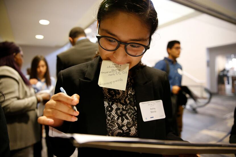 Ashley Montiel looks through her job options during the Mayor's Intern Fellows Program at...